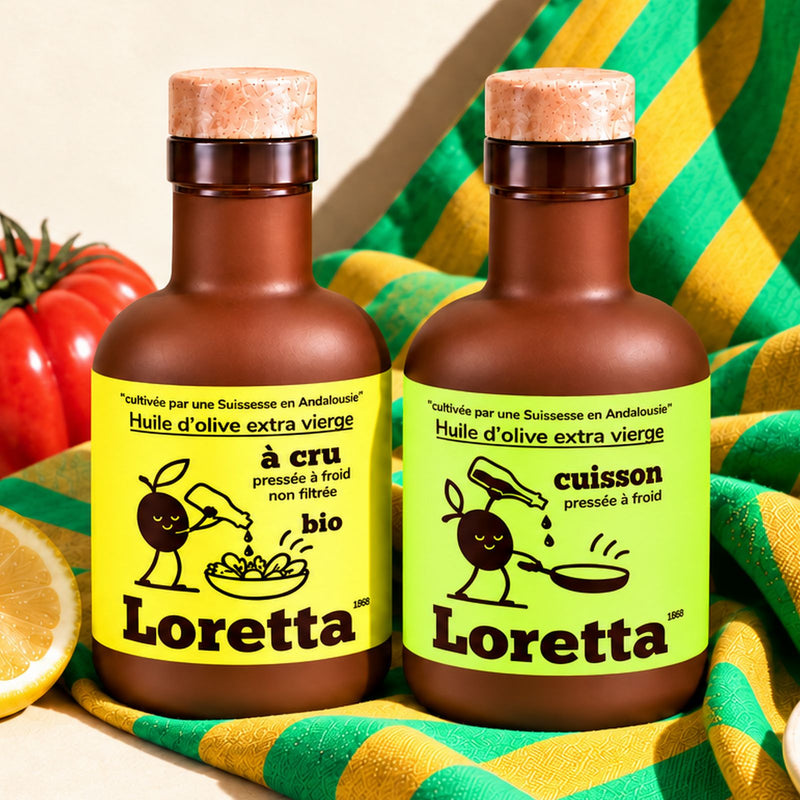 les deux bouteilles 500ml d'huile d'olive extra vierges et pressées à froid Loretta à cru et cuisson